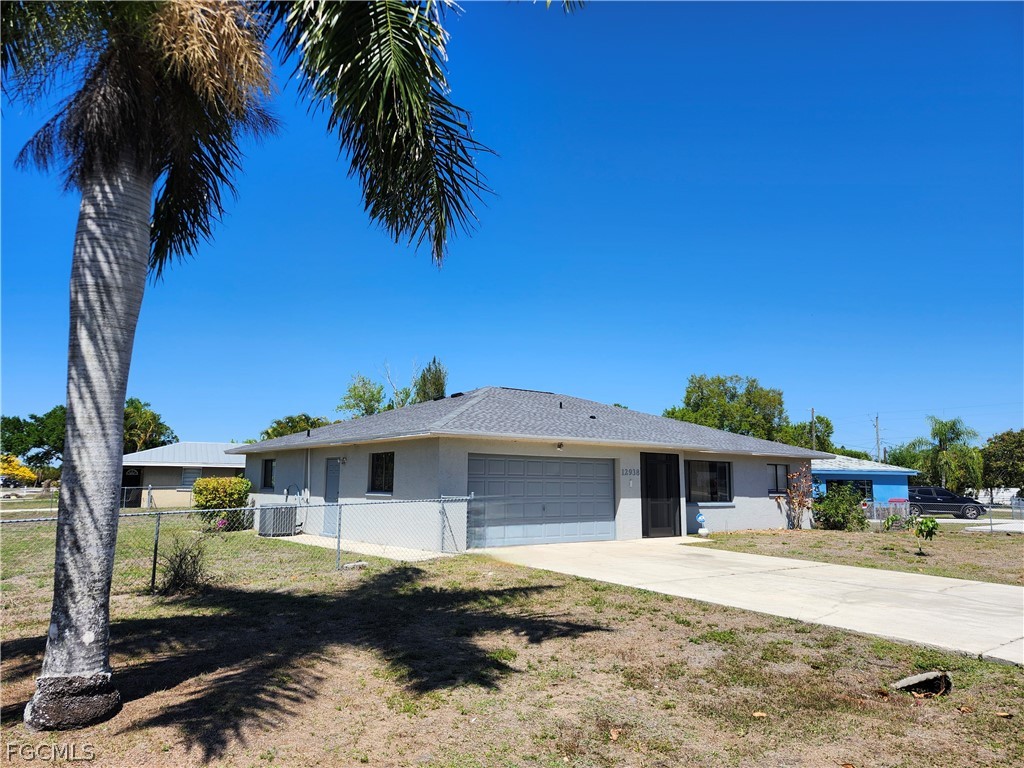 12938 5th Street Fort Myers, FL 33905 - Photo 24 of 25 a front view of a house with garden