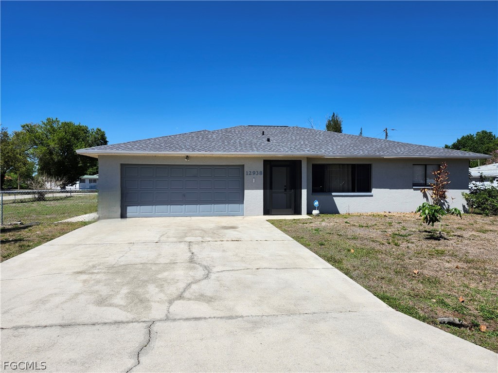 12938 5th Street Fort Myers, FL 33905 - Photo 25 of 25 a view of a house with a yard and plants