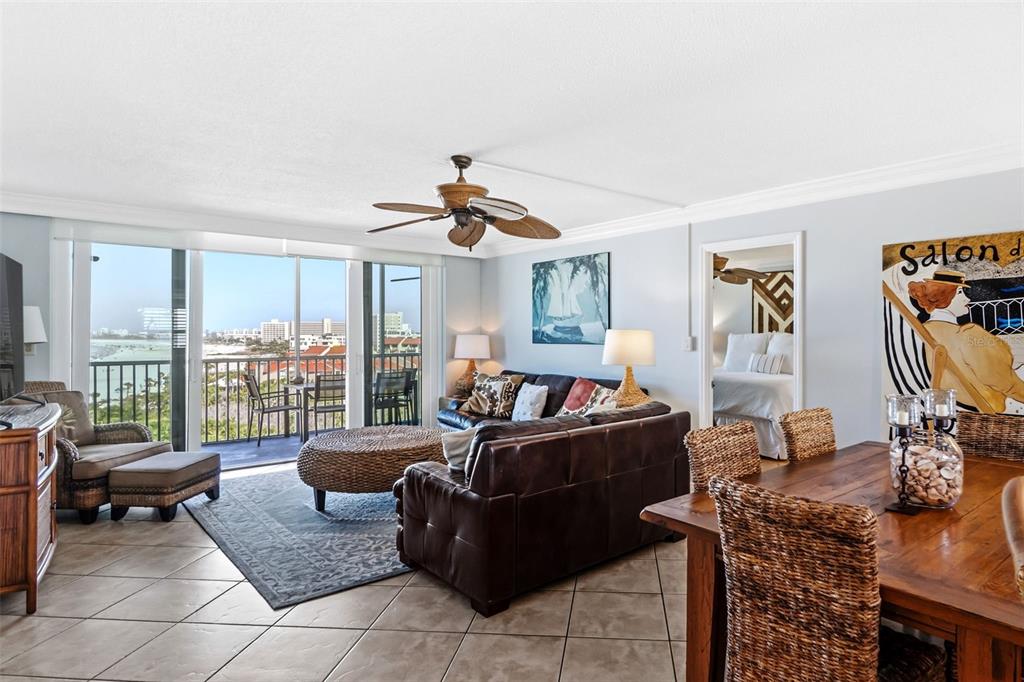 6300 Midnight Pass Road, Unit 708 Sarasota, FL 34242 - Photo 11 of 49 a living room with furniture and a flat screen tv