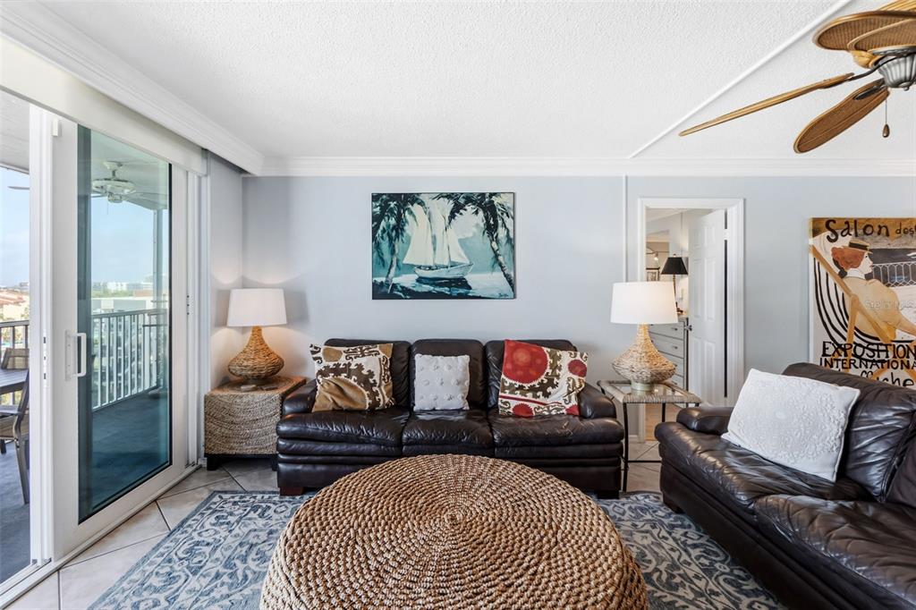 6300 Midnight Pass Road, Unit 708 Sarasota, FL 34242 - Photo 19 of 49 a bedroom with furniture and a rug