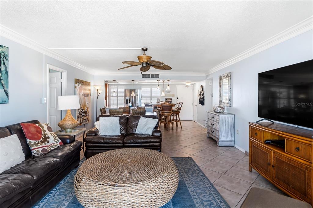 6300 Midnight Pass Road, Unit 708 Sarasota, FL 34242 - Photo 21 of 49 a living room with furniture and a flat screen tv