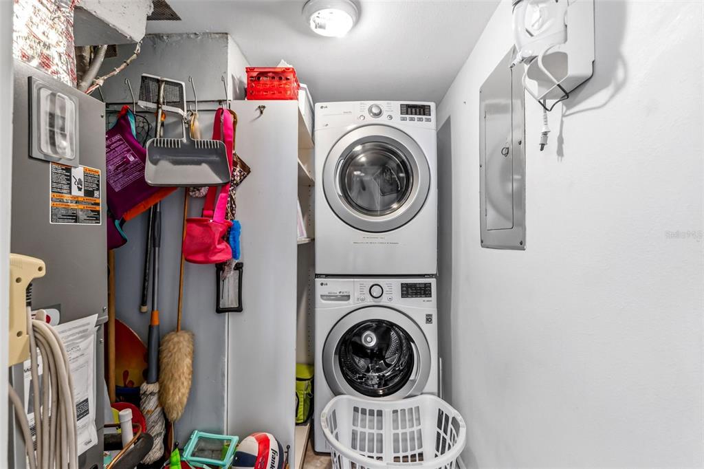 6300 Midnight Pass Road, Unit 708 Sarasota, FL 34242 - Photo 36 of 49 a utility room with dryer and washer