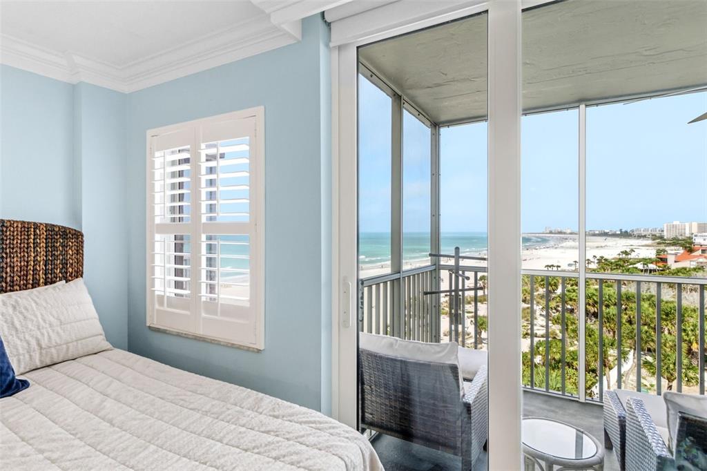 6300 Midnight Pass Road, Unit 708 Sarasota, FL 34242 - Photo 38 of 49 a bedroom with a bed and a window