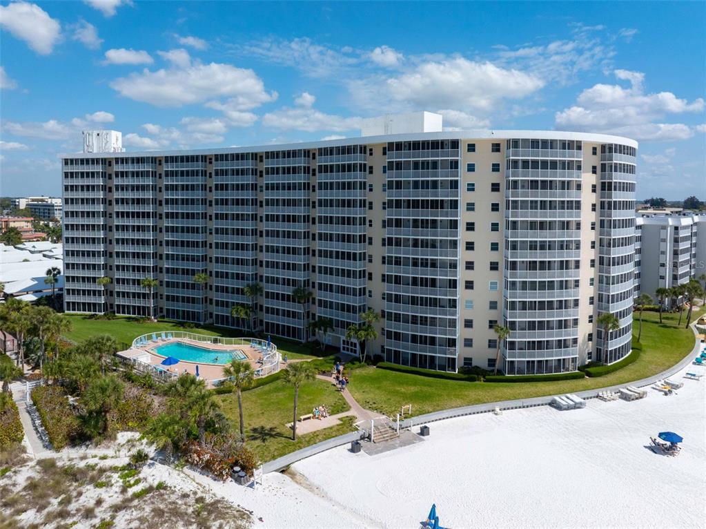 6300 Midnight Pass Road, Unit 708 Sarasota, FL 34242 - Photo 48 of 49 a view of a blue building with a street