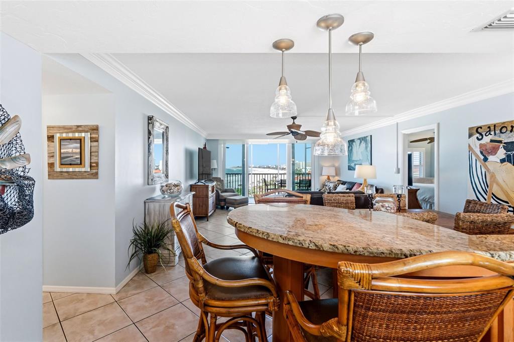 6300 Midnight Pass Road, Unit 708 Sarasota, FL 34242 - Photo 6 of 49 a view of a dining room and livingroom furniture
