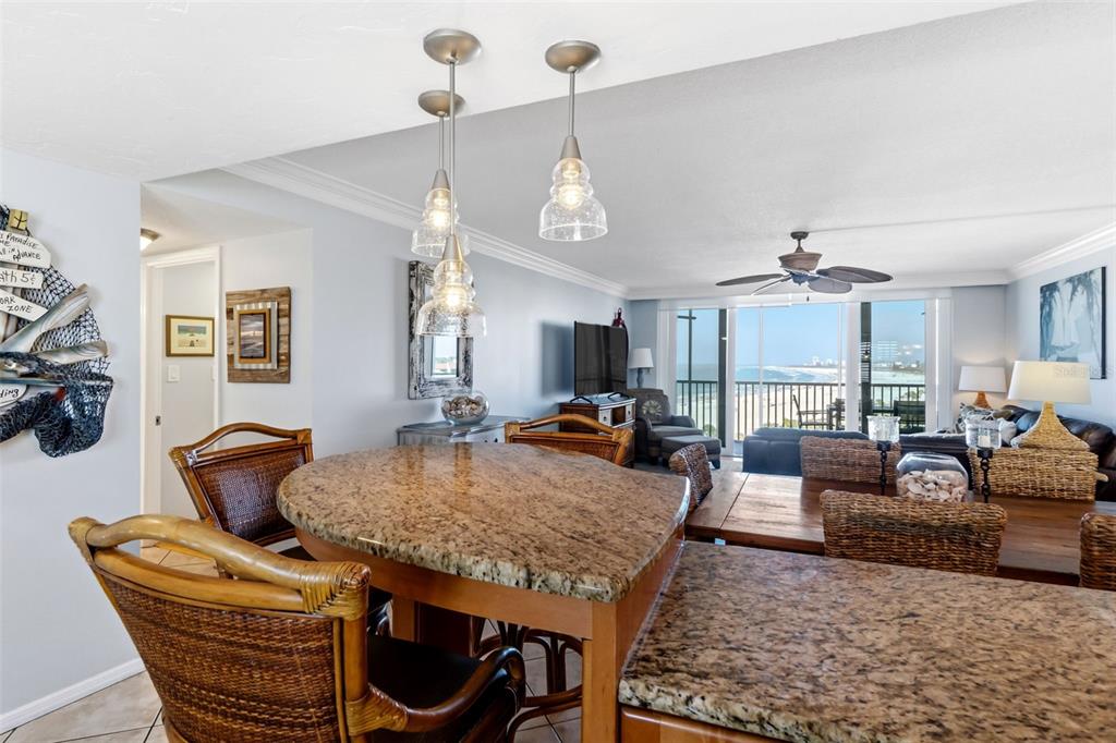 6300 Midnight Pass Road, Unit 708 Sarasota, FL 34242 - Photo 7 of 49 a living room with furniture and wooden floor