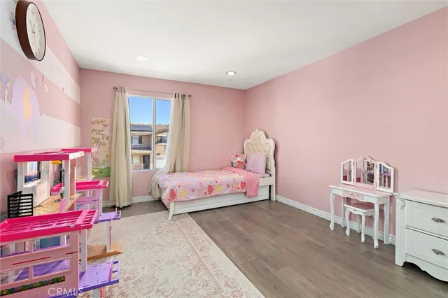 a bedroom with furniture and a bed