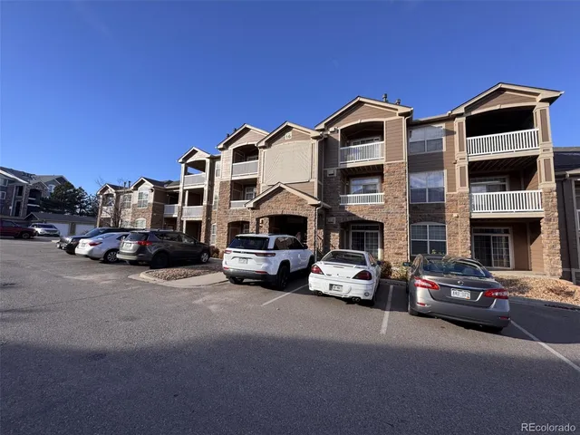 a car parked in front of a house