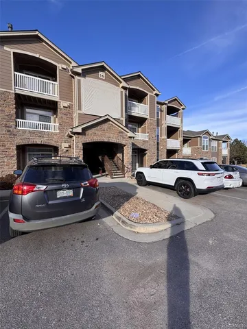 a car parked in front of a house