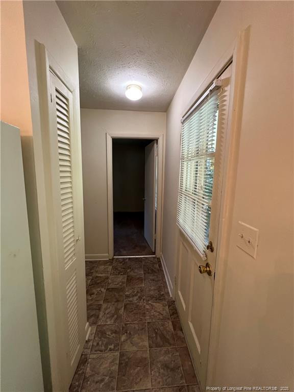 116 Oates Drive, Unit A Fayetteville, NC 28311 - Photo 6 of 9 a view of hallway with window and stairs