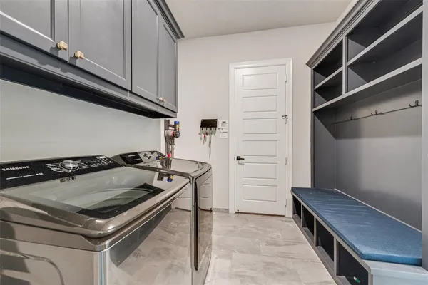 a view of a kitchen with a staircase