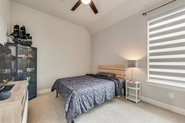 a bedroom with furniture