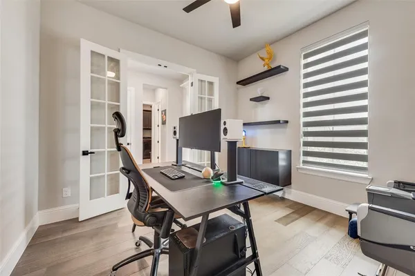 a workspace with furniture and a window