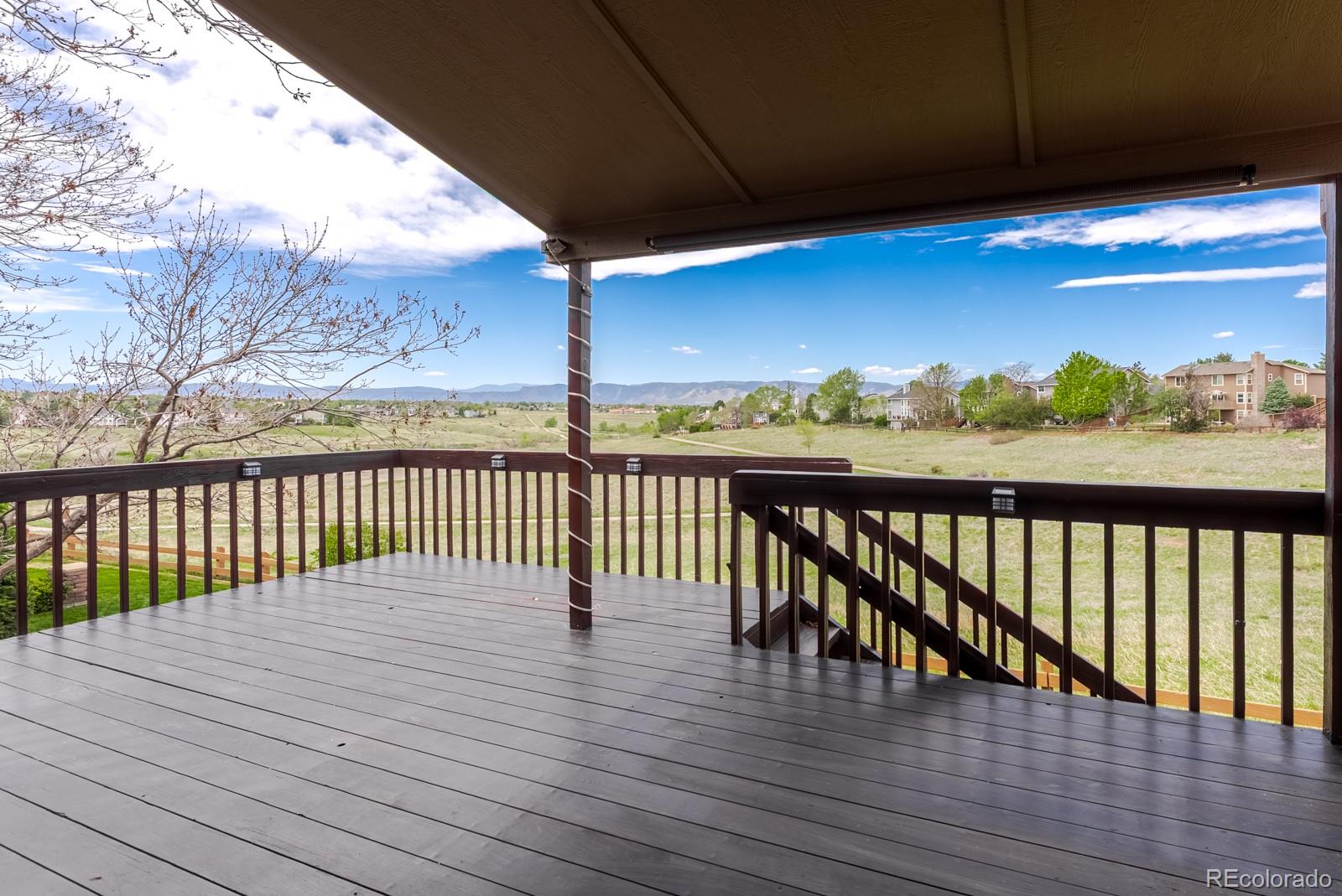 1914 Terrace Drive Highlands Ranch, CO 80126 - Photo 41 of 47 a view of deck with wooden floor and outdoor space