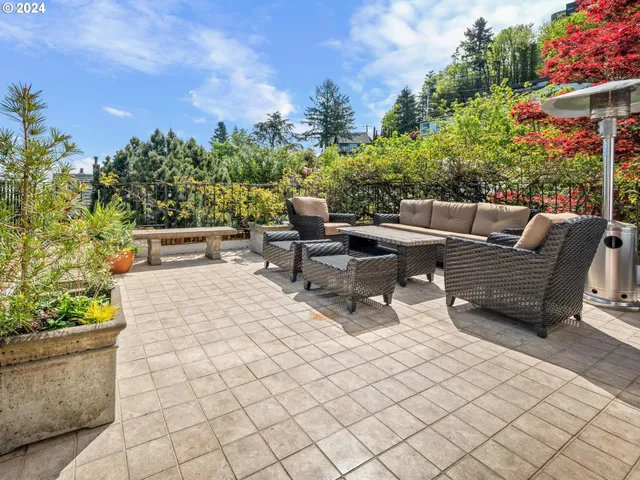a view of a terrace with furniture