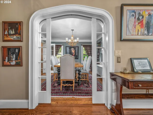 a view of dining room with furniture and wooden floor