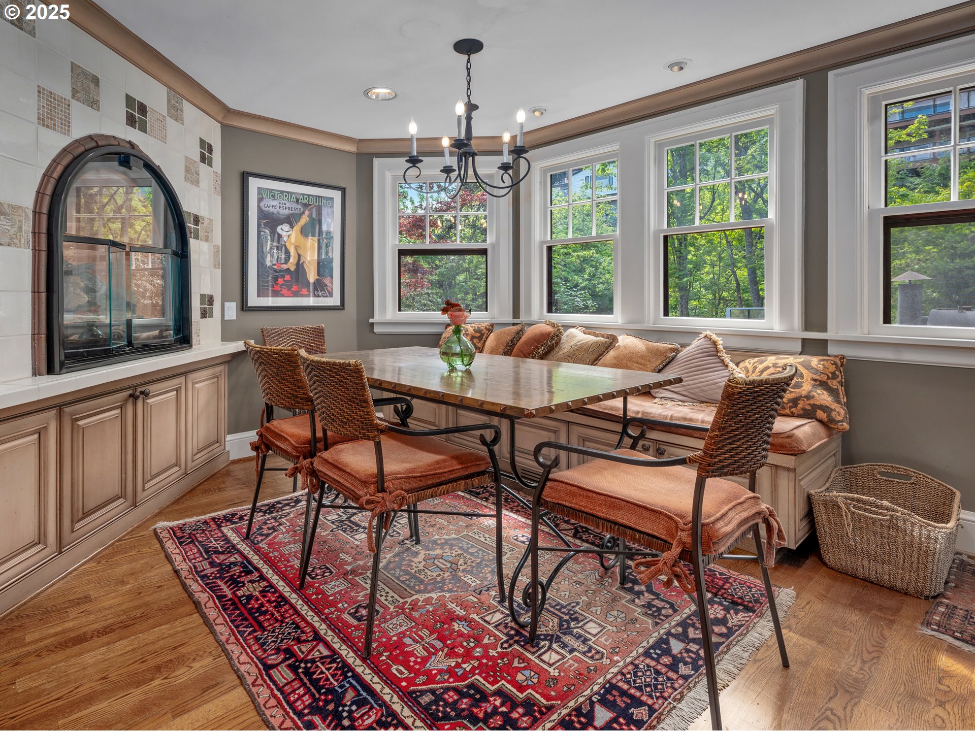 758 Northwest Powhatan Terrace Portland, OR 97210 - Photo 19 of 48 a living room with furniture a chandelier and a large window