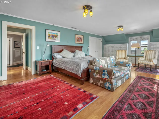 a bedroom with a bed and a couch