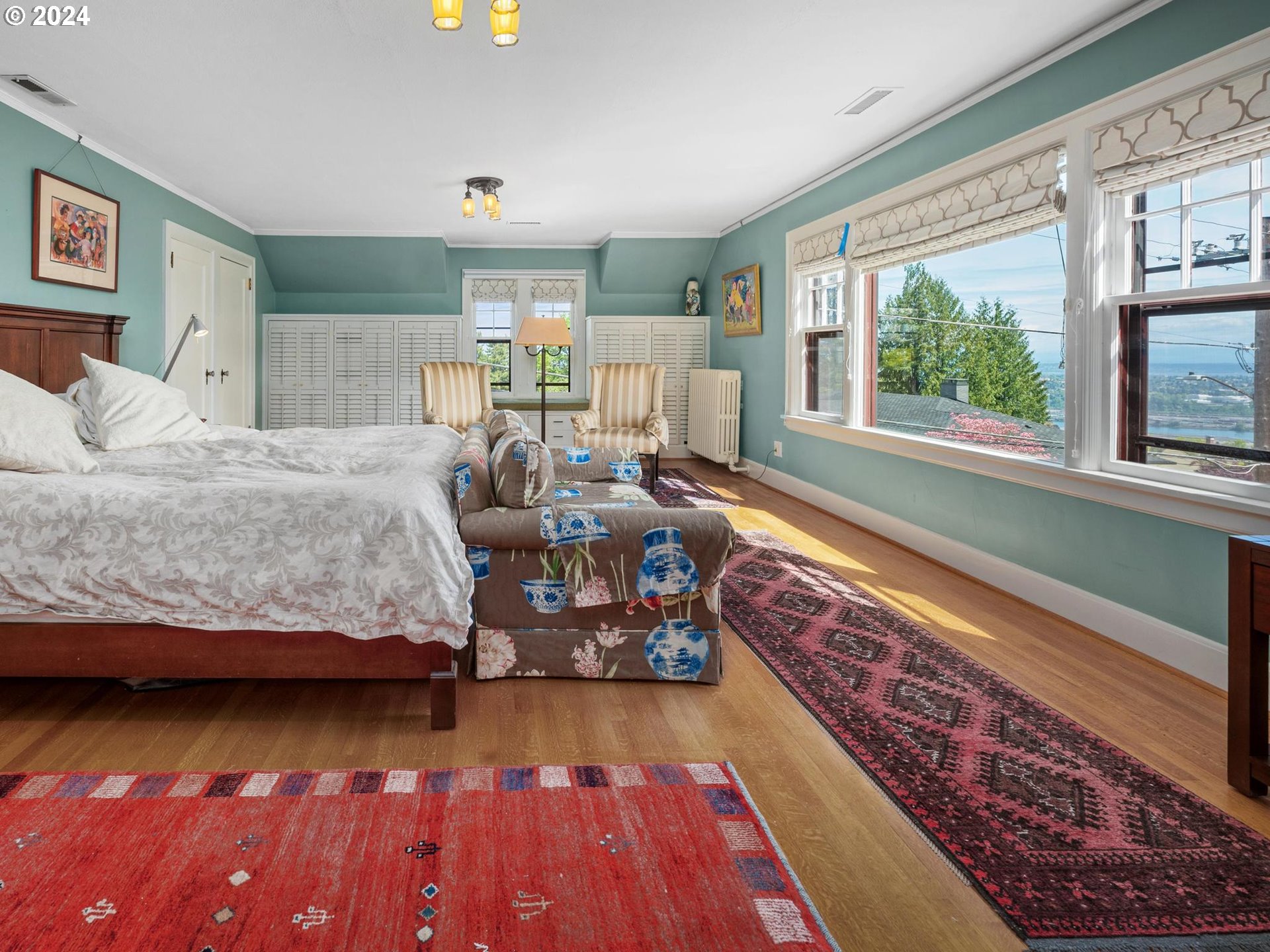758 Northwest Powhatan Terrace Portland, OR 97210 - Photo 25 of 48 a living room with furniture and a large window