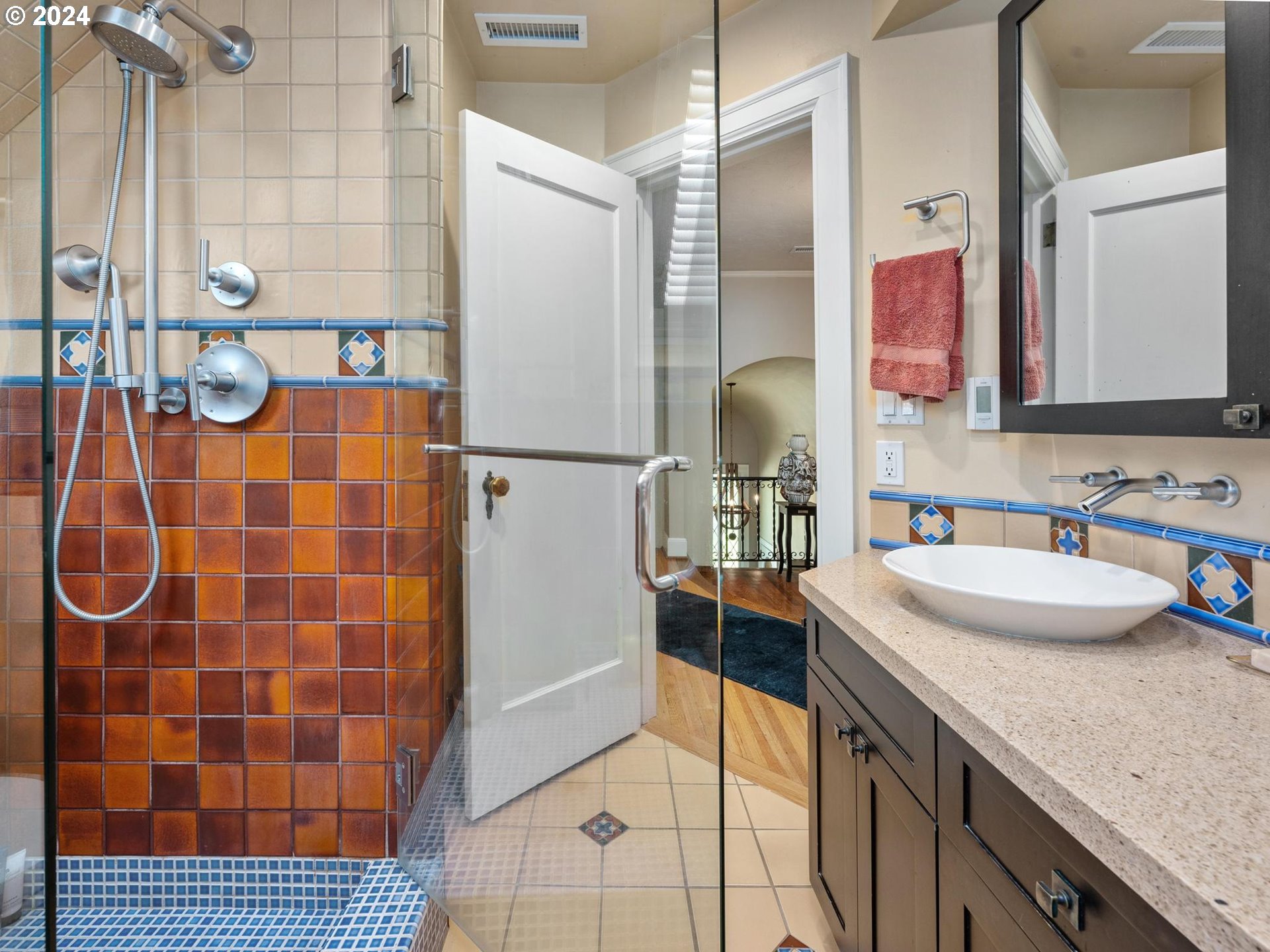 758 Northwest Powhatan Terrace Portland, OR 97210 - Photo 32 of 48 a bathroom with a sink a double vanity and a mirror