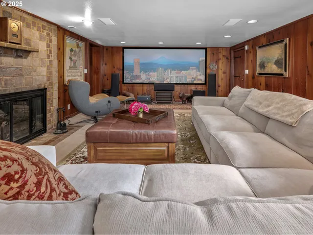 a living room with furniture and a rug