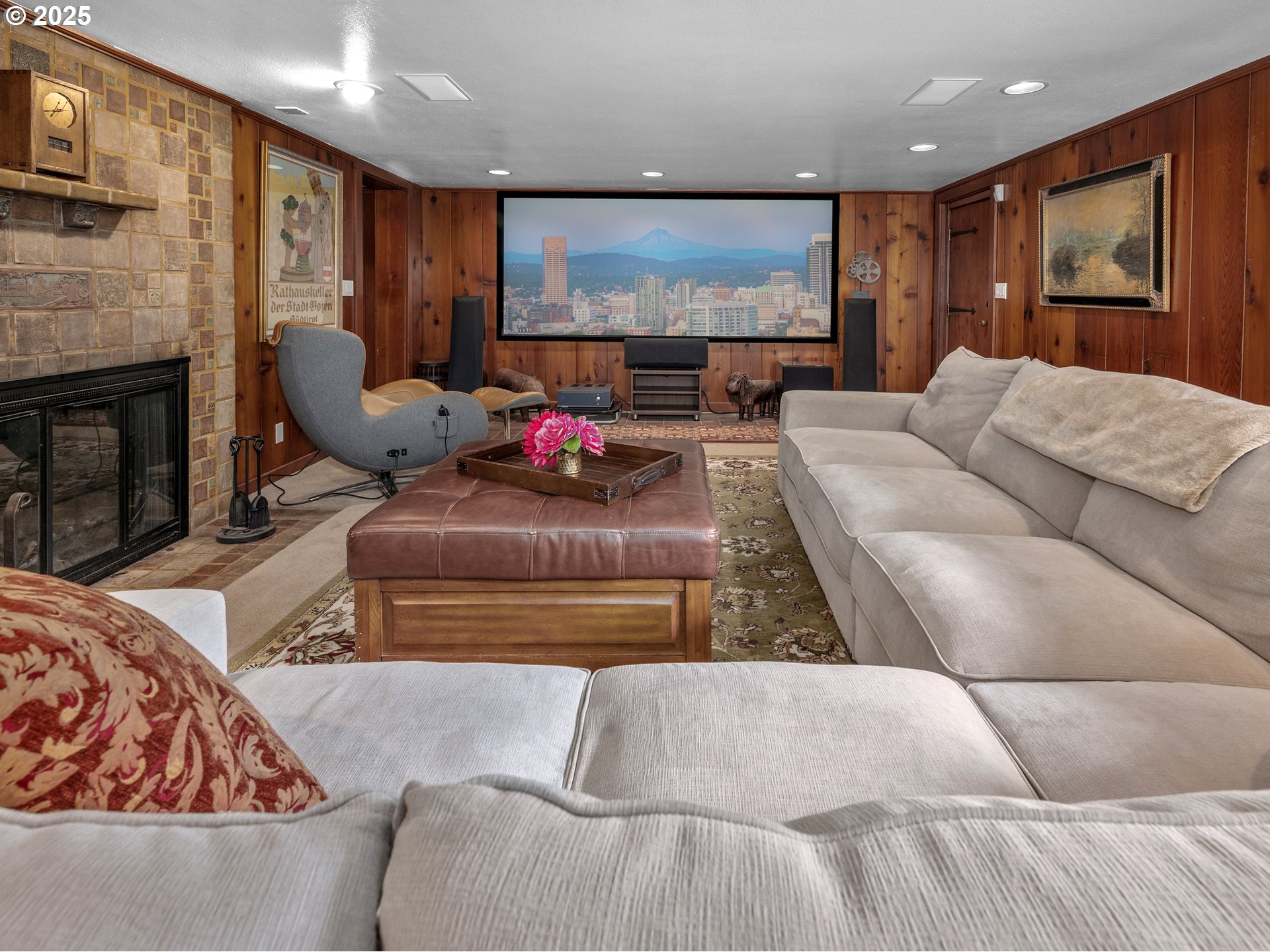758 Northwest Powhatan Terrace Portland, OR 97210 - Photo 34 of 48 a living room with furniture and a flat screen tv