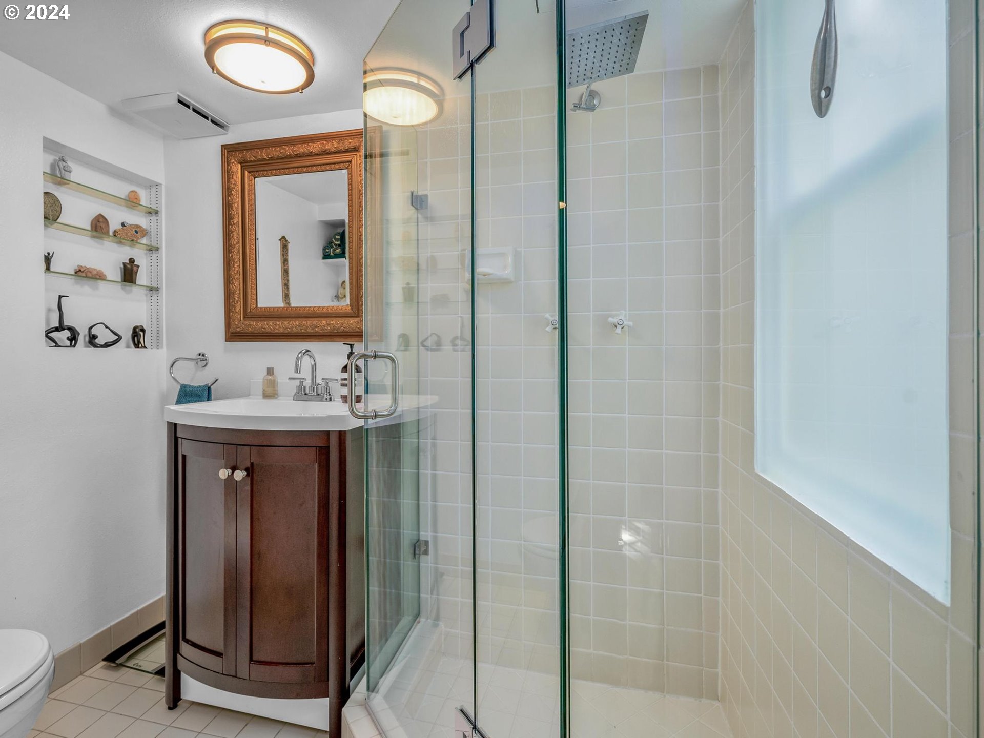 758 Northwest Powhatan Terrace Portland, OR 97210 - Photo 40 of 48 a bathroom with a sink a toilet and shower