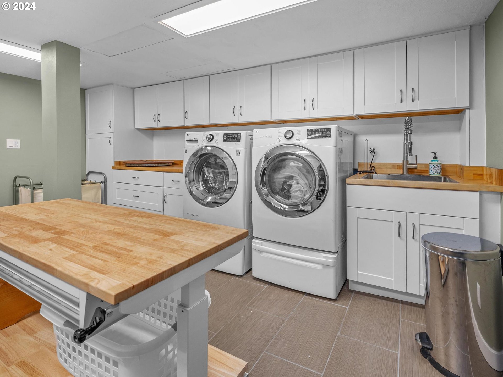758 Northwest Powhatan Terrace Portland, OR 97210 - Photo 41 of 48 a utility room with dryer and washer