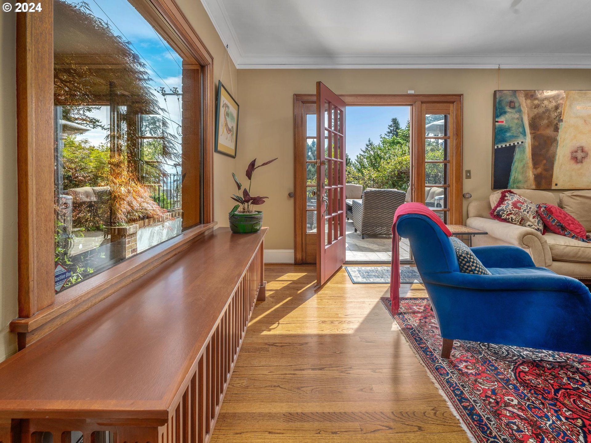 758 Northwest Powhatan Terrace Portland, OR 97210 - Photo 9 of 48 a living room with furniture and a large window
