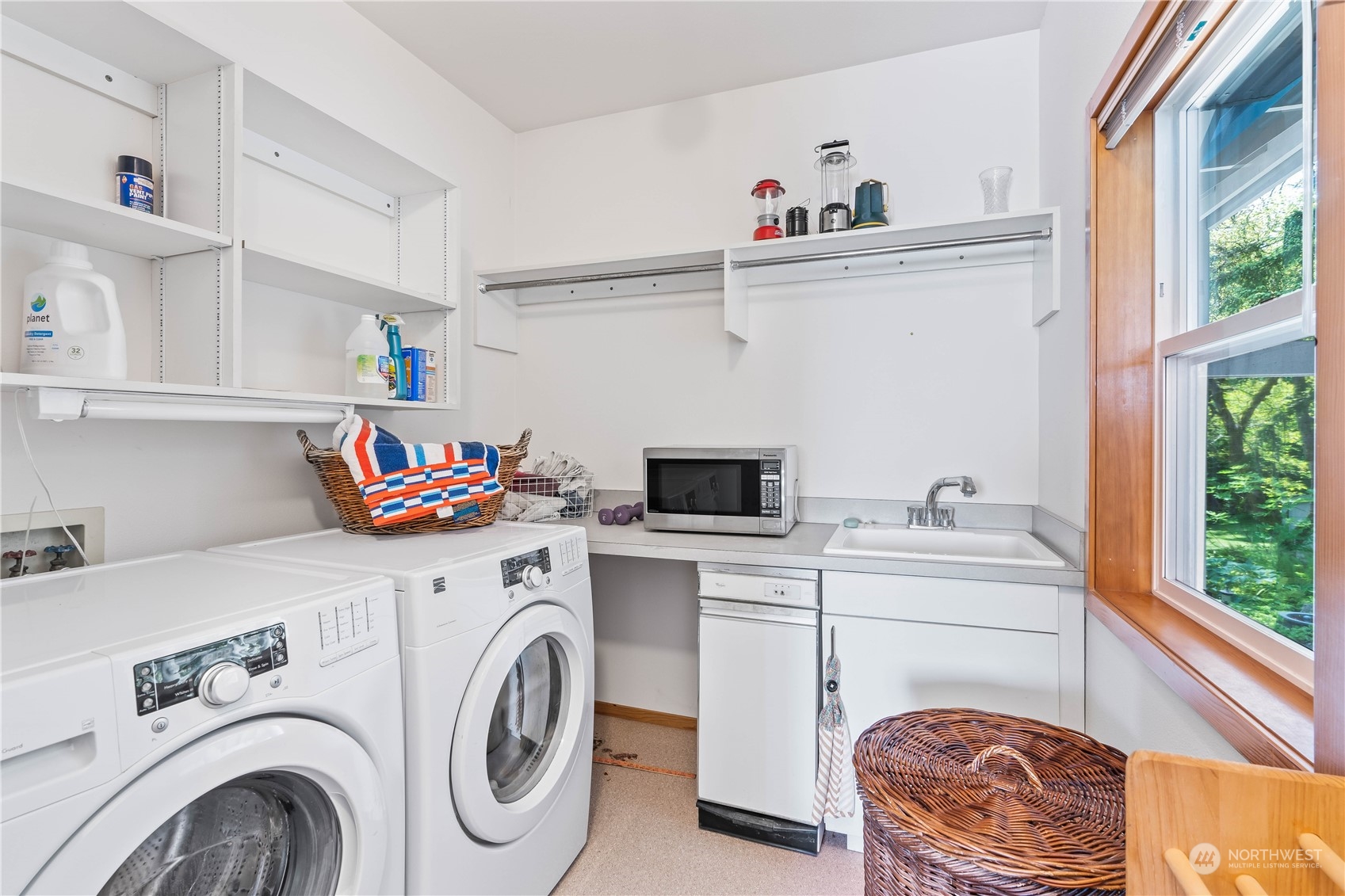 8615 Higgins Cove Road Anderson Island, WA 98303 - Photo 29 of 40 a utility room with sink dryer and washer