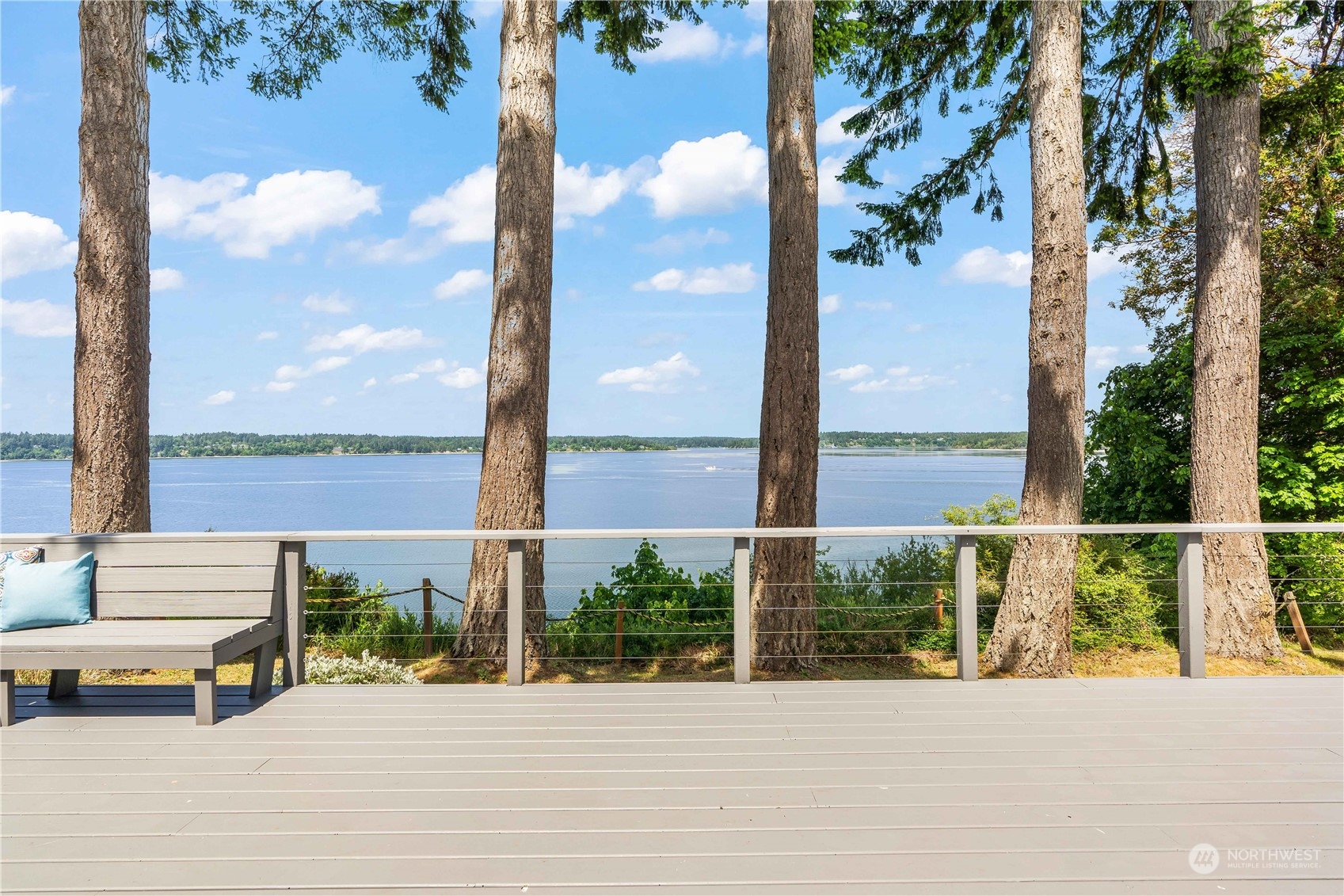 8615 Higgins Cove Road Anderson Island, WA 98303 - Photo 32 of 40 a view of a street with seating area