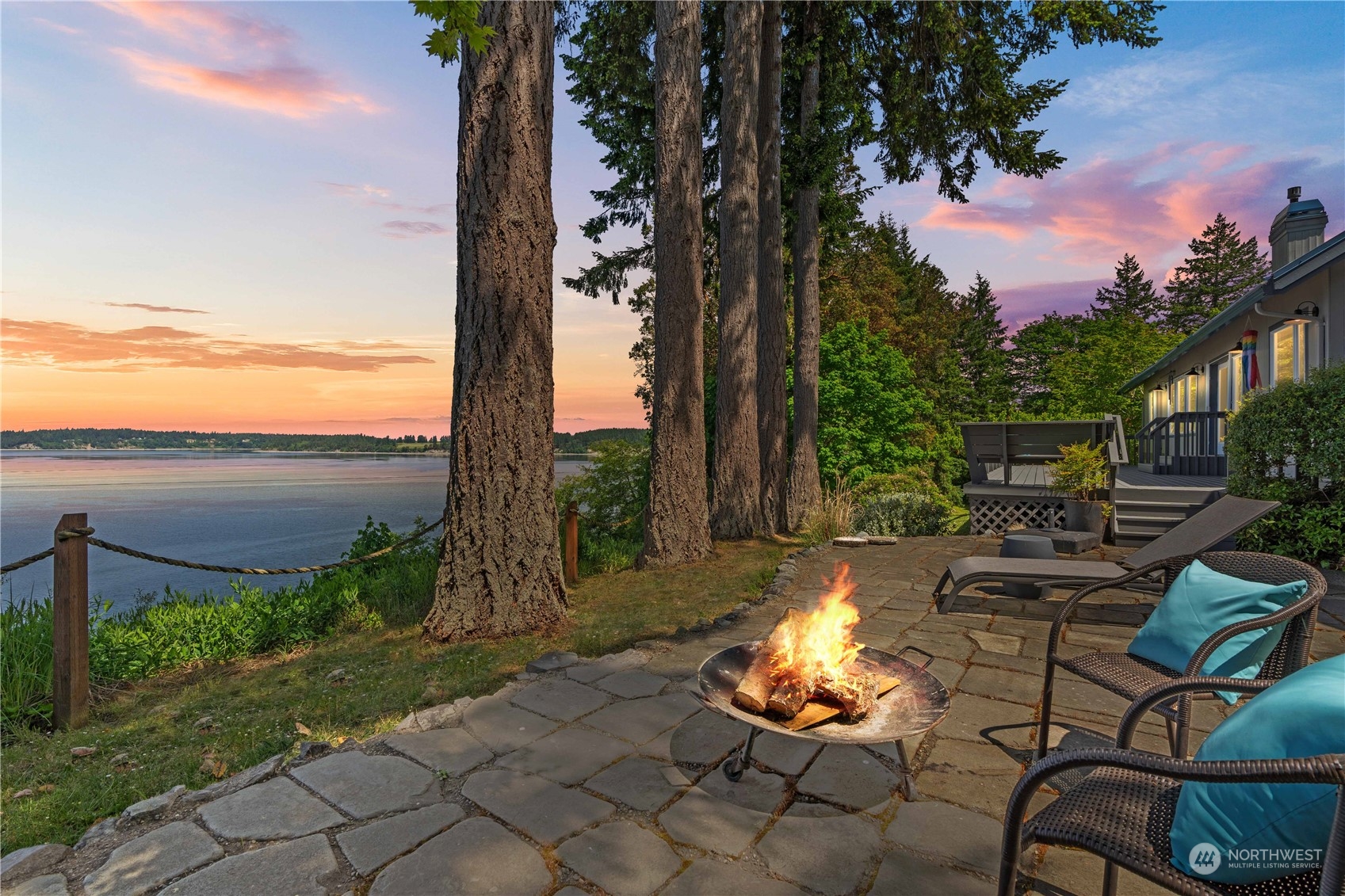 8615 Higgins Cove Road Anderson Island, WA 98303 - Photo 9 of 40 a view of a backyard with sitting area