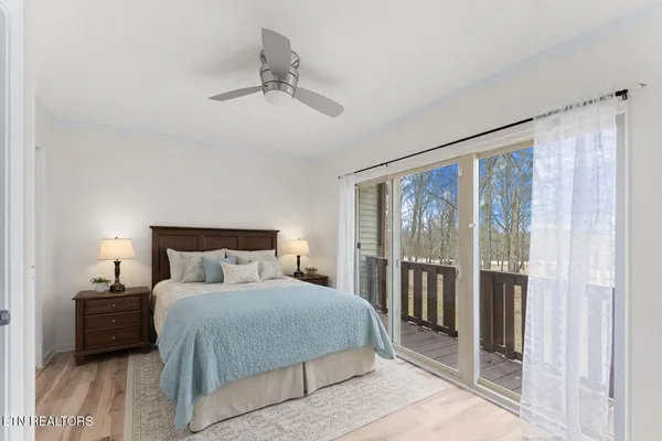 a view of a room with wooden floor and closet