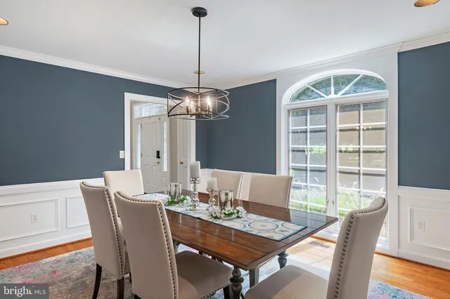 a kitchen with kitchen island a sink stove and refrigerator