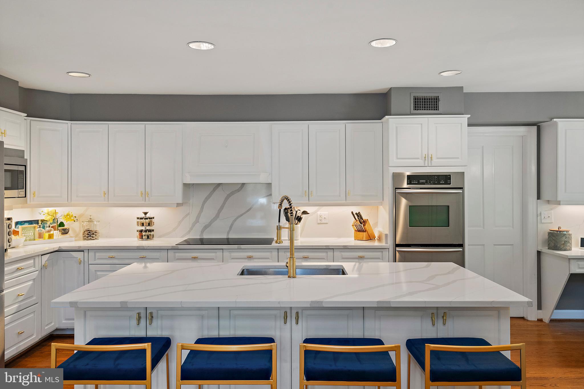 812 Coachway Annapolis, MD 21401 - Photo 21 of 75 a kitchen with stainless steel appliances a sink a stove and a refrigerator