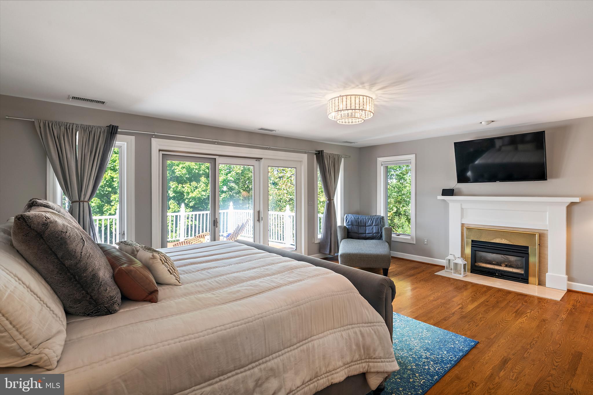 812 Coachway Annapolis, MD 21401 - Photo 28 of 75 a bedroom with a bed and a fireplace