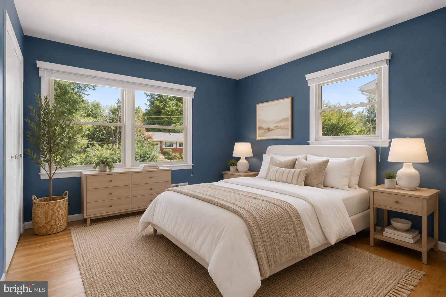 822 Loxford Terrace Silver Spring, MD 20901 - Photo 28 of 61 a bedroom with a bed and a large window
