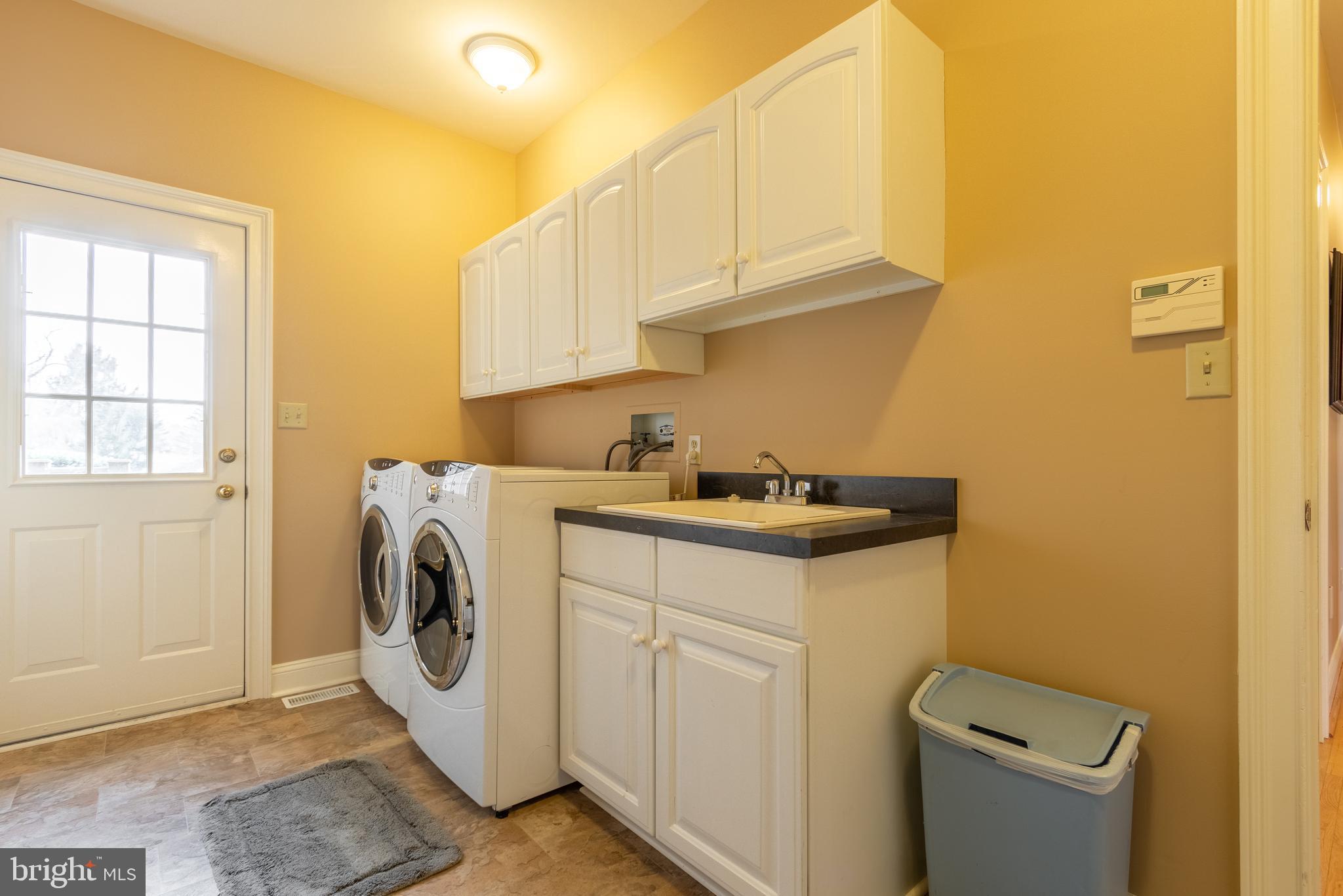 3690 Secondwoods Road Doylestown, PA 18902 - Photo 15 of 30 Main Floor Laundry Mudroom with door to back patio