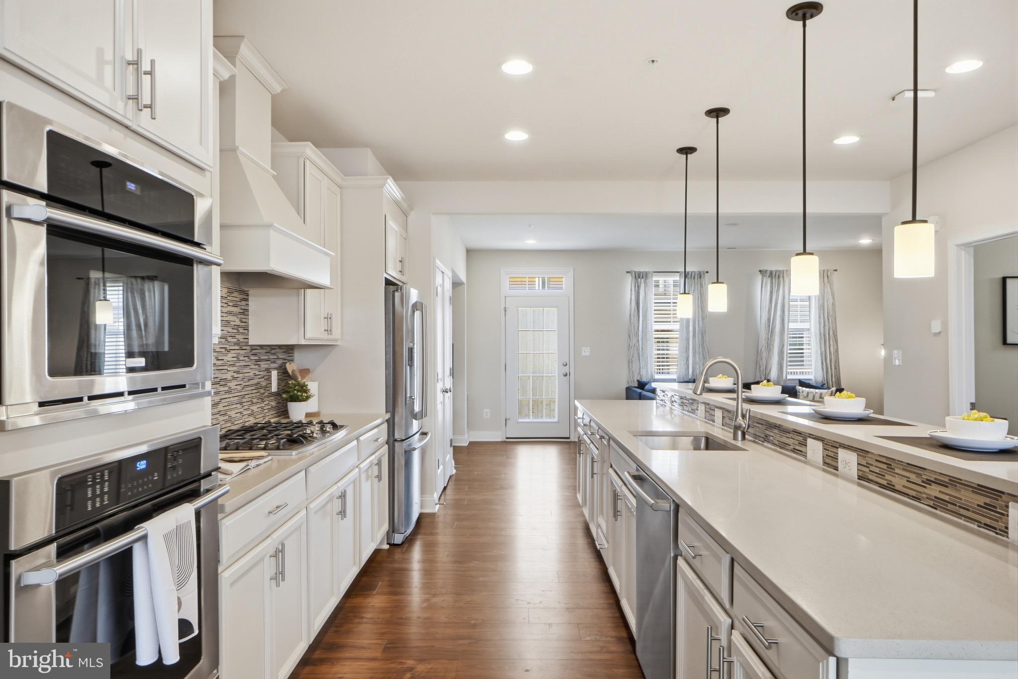 7134 Proclamation Place Frederick, MD 21703 - Photo 12 of 40 Gas cooking, stone counters