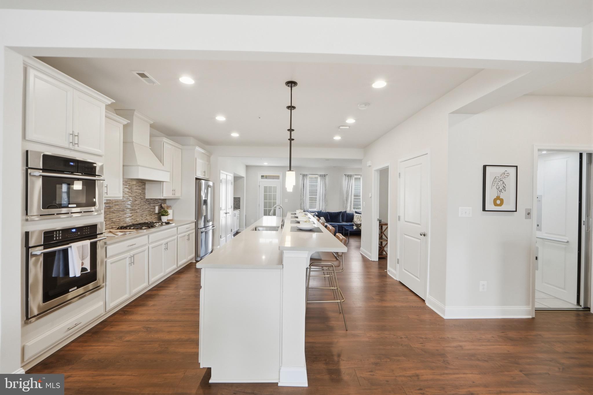 7134 Proclamation Place Frederick, MD 21703 - Photo 2 of 40 ELEVATOR opens to the kitchen and dining room!