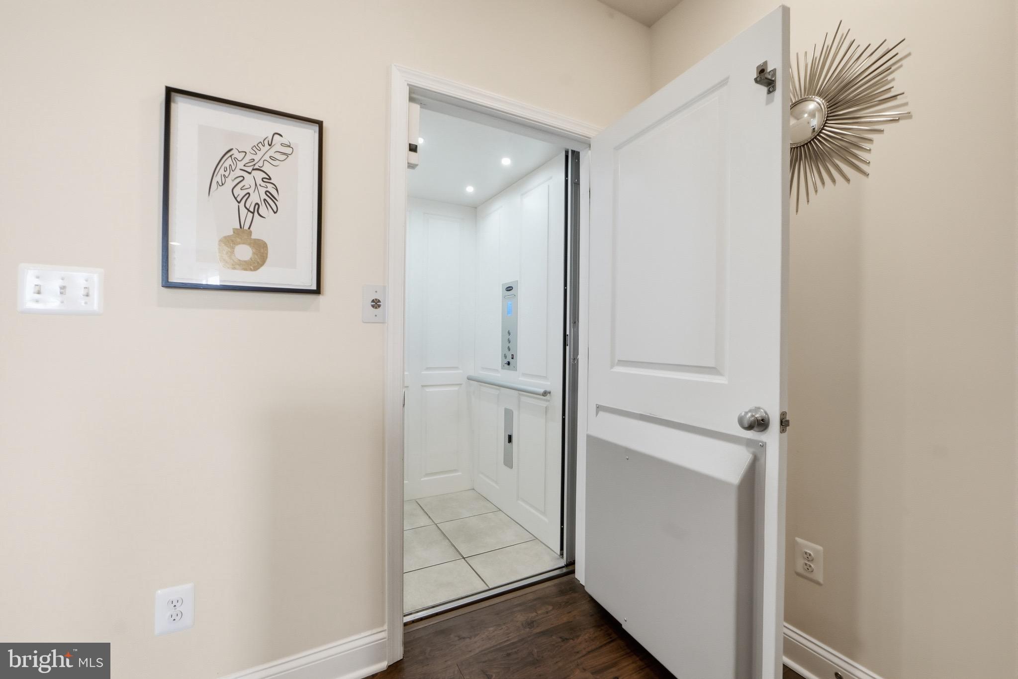 7134 Proclamation Place Frederick, MD 21703 - Photo 4 of 40 Private elevator to all levels!!!