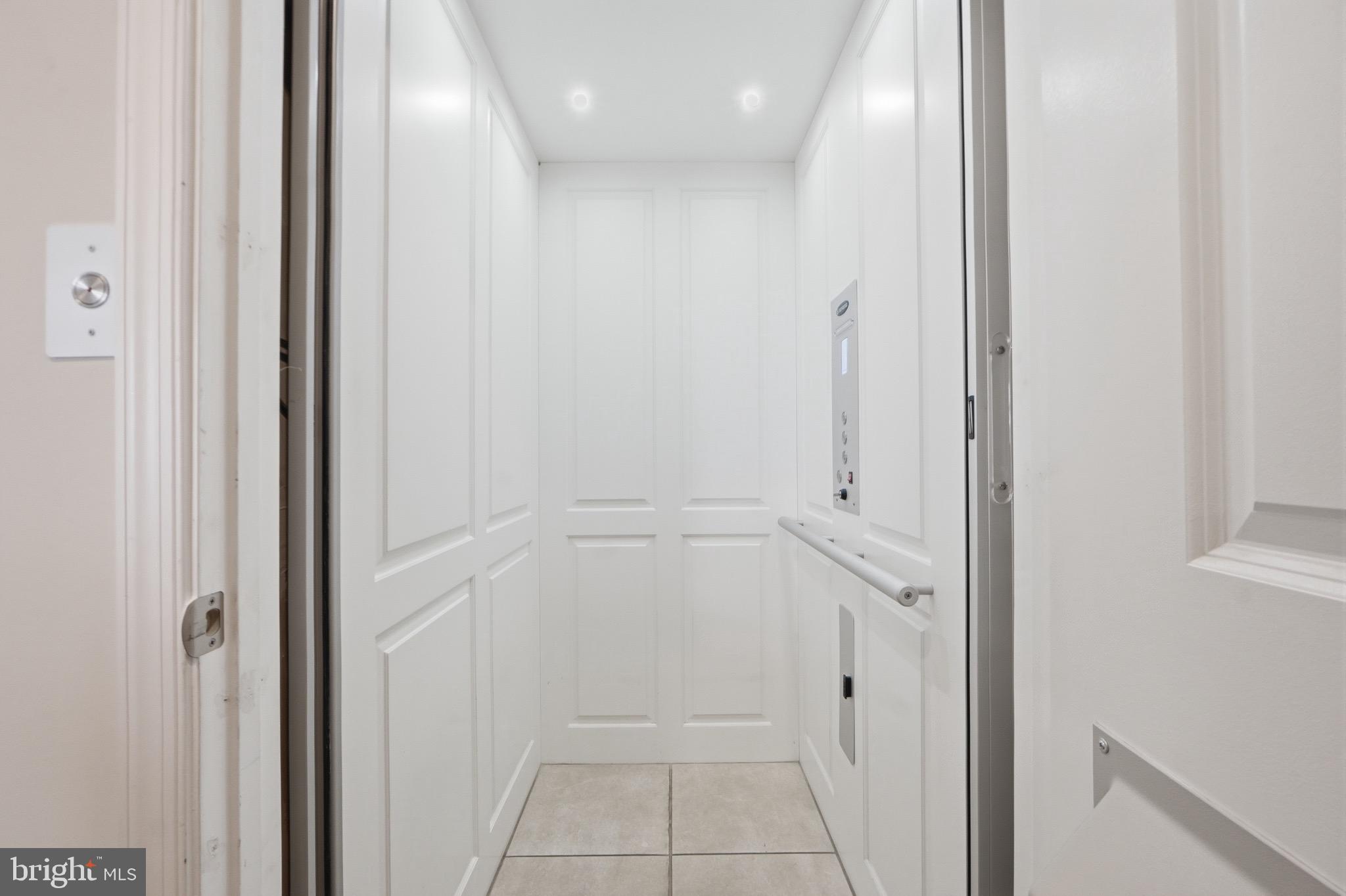 7134 Proclamation Place Frederick, MD 21703 - Photo 5 of 40 Private elevator to all levels!!!