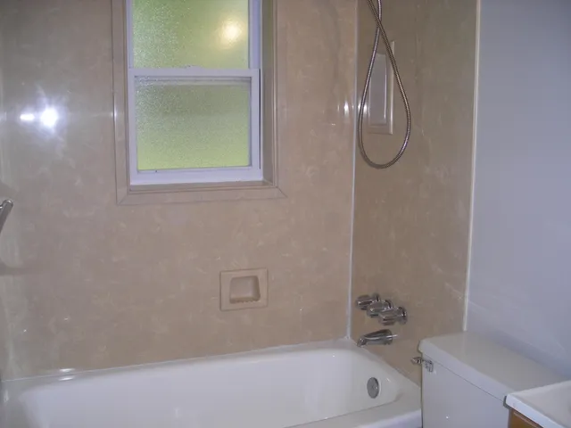 a bathroom with a bathtub