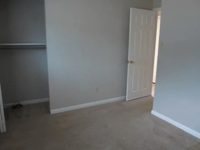 an empty room with closet