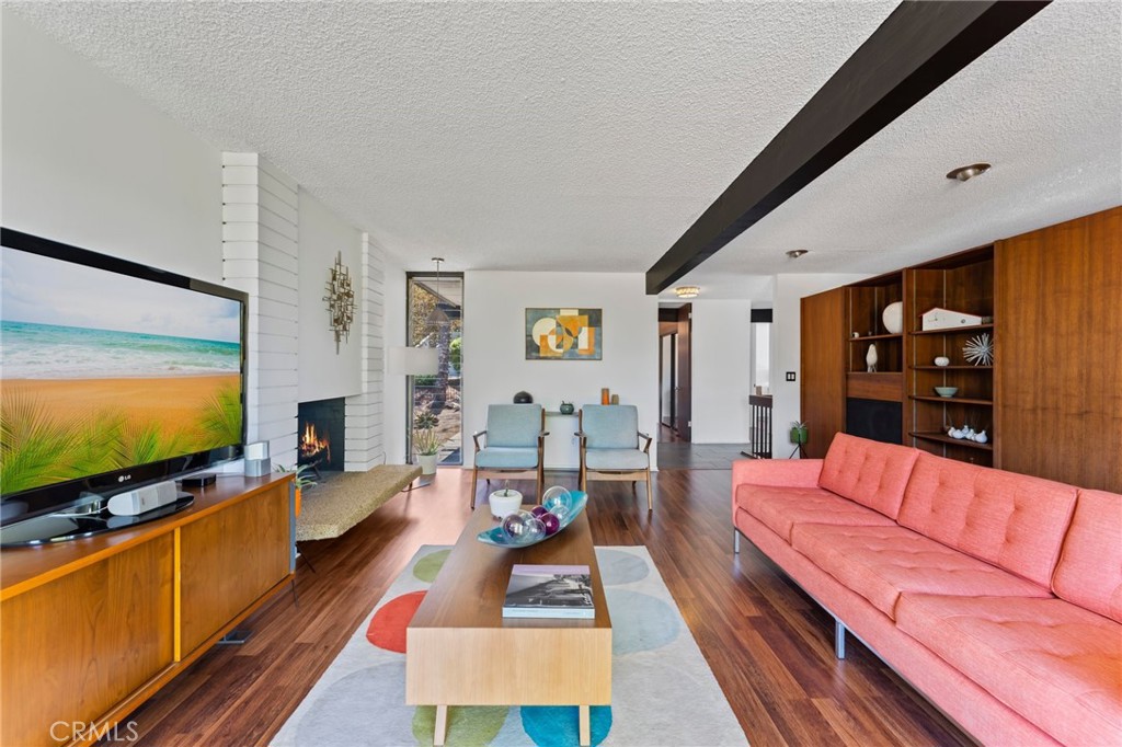4259 Quail Road Riverside, CA 92507 - Photo 11 of 72 a living room with furniture and a flat screen tv