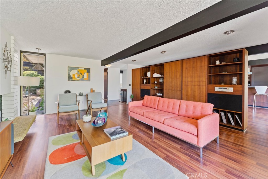 4259 Quail Road Riverside, CA 92507 - Photo 12 of 72 a living room with furniture and wooden floor