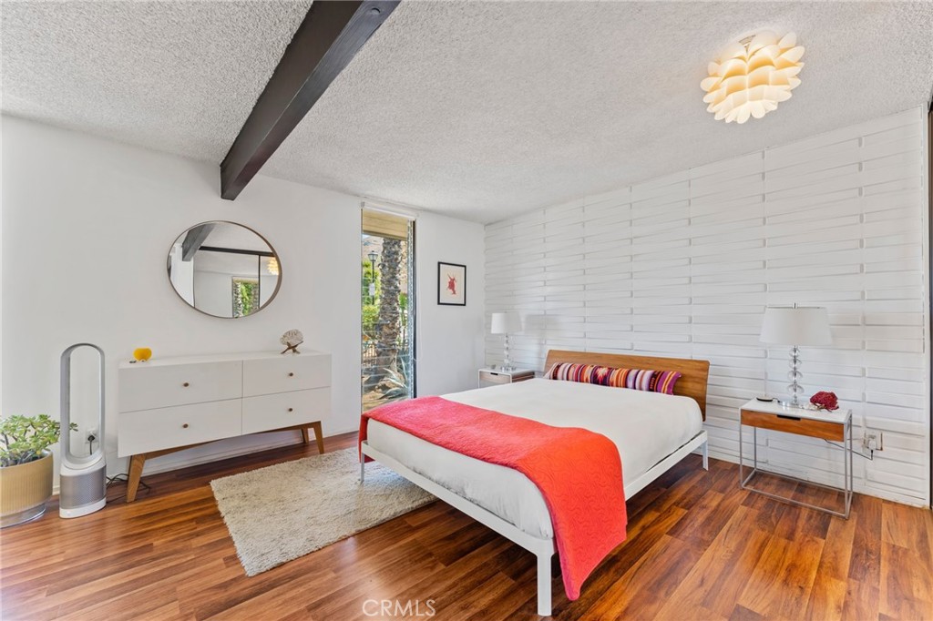 4259 Quail Road Riverside, CA 92507 - Photo 32 of 72 a bedroom with a bed and a table