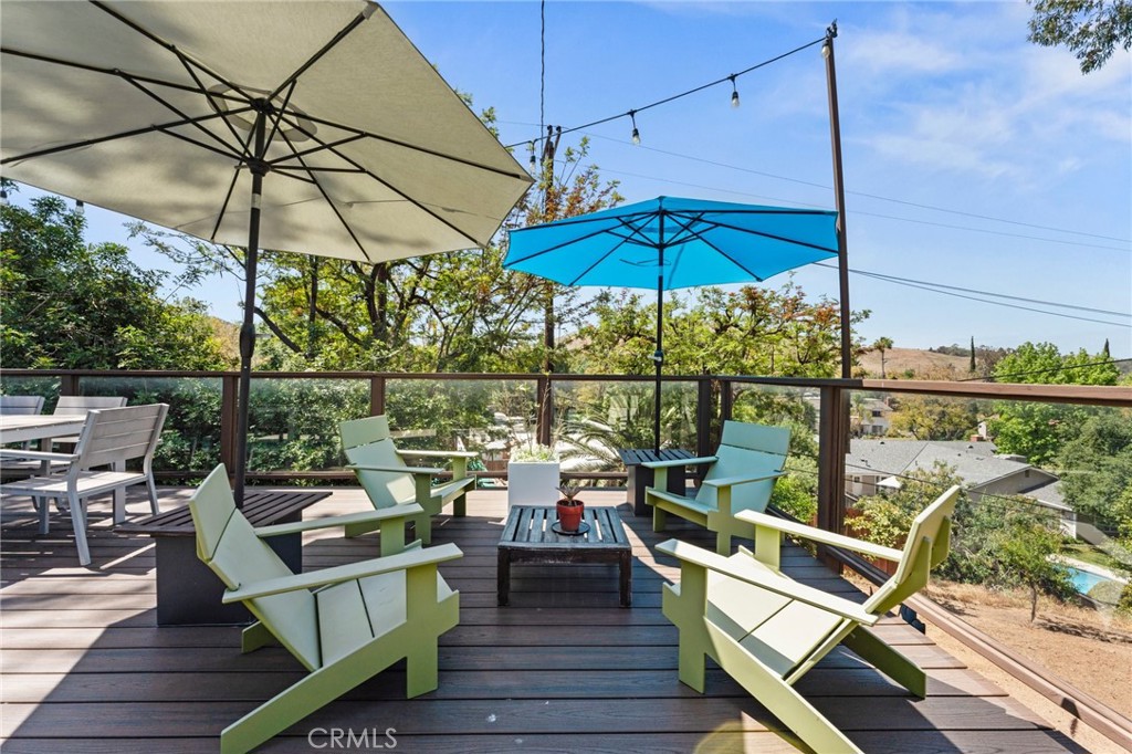 4259 Quail Road Riverside, CA 92507 - Photo 53 of 72 a view of deck with seating area and wooden floor