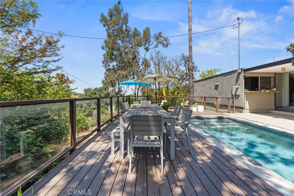 4259 Quail Road Riverside, CA 92507 - Photo 54 of 72 a view of balcony with chairs and wooden floor