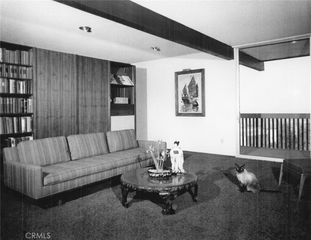 4259 Quail Road Riverside, CA 92507 - Photo 65 of 72 a living room with furniture and wooden floor